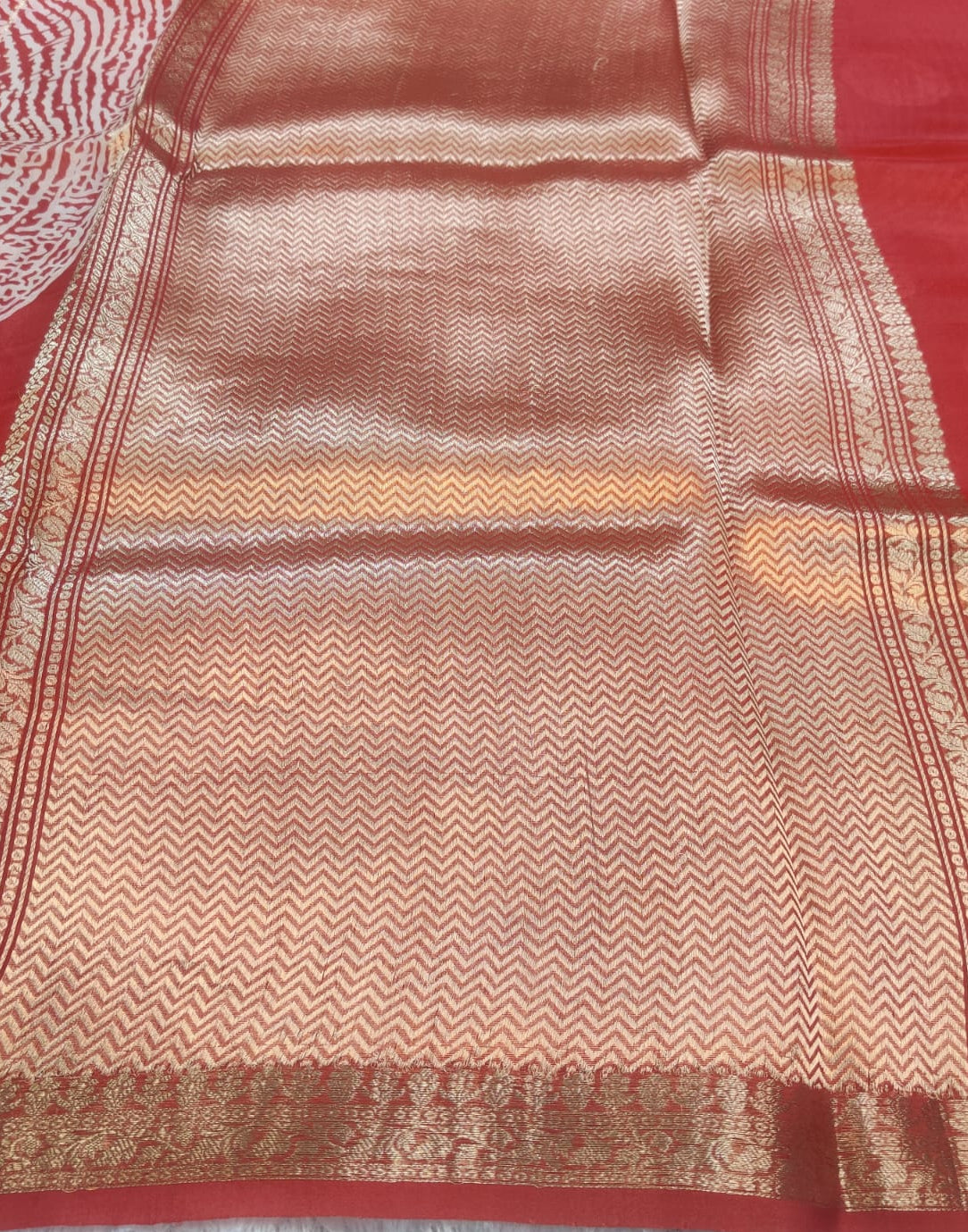 Banarasi Kora Organza Kadua Interlock Weaving Designer Saree – Coral Red Fingerprint Motif